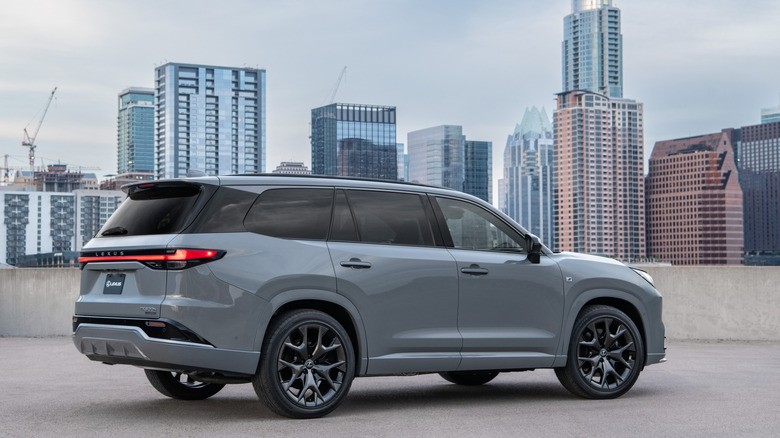 Rear-quarter shot of a gray Lexus TX Hybrid