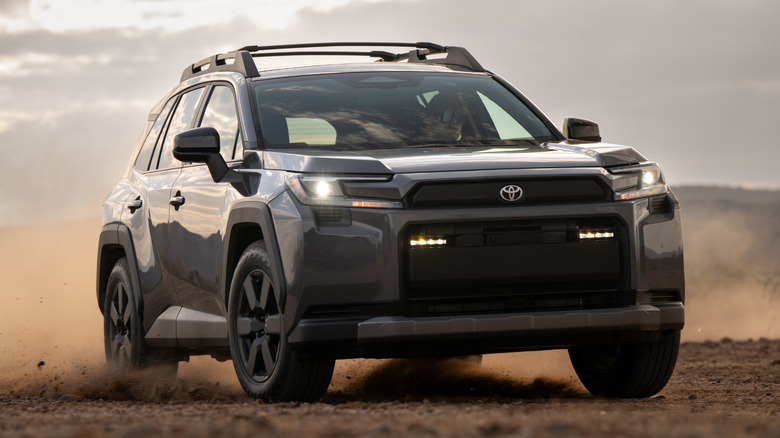 A Toyota RAV4 driving on dirt.