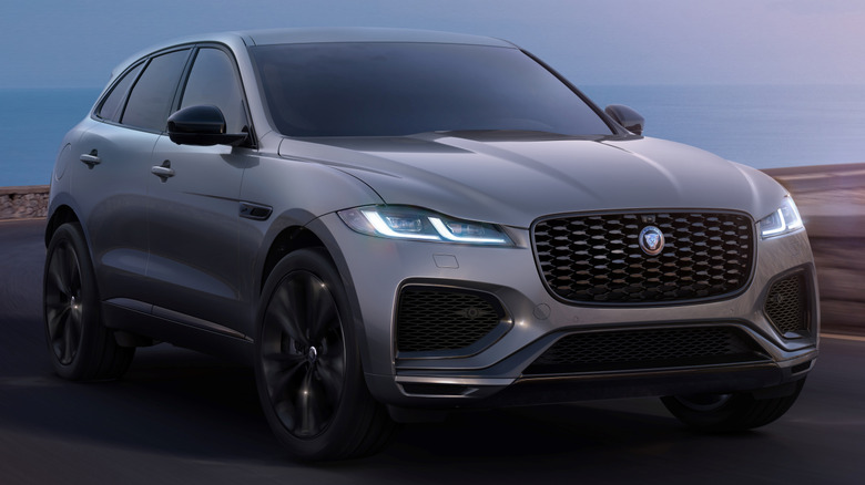 3/4 front action shot of a Jaguar F‑PACE 90th Anniversary Edition