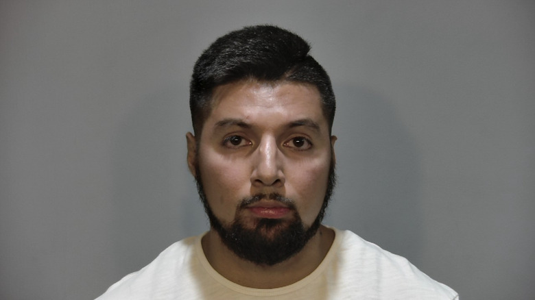 The headshot of former deputy Lamar Roman.