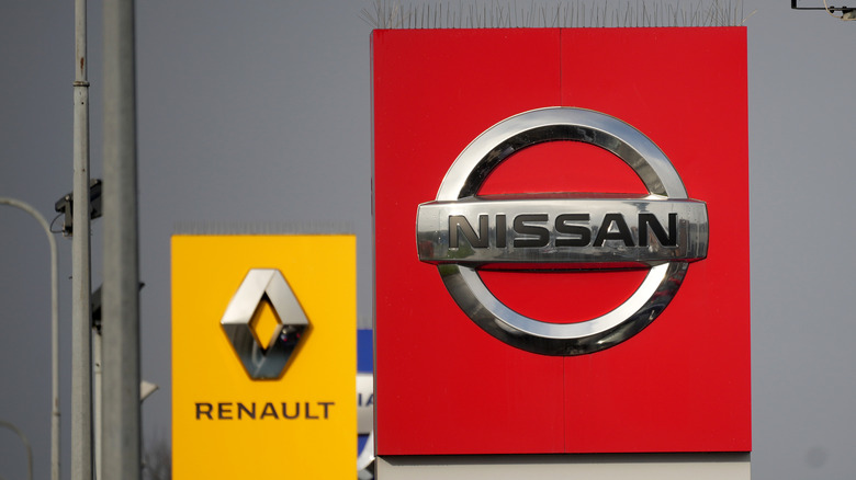 The Renault and Nissan logos are seen outside a showroom on November 15, 2024 in Crewe, England.