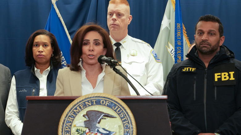 US Attorney for the District of Columbia Jeanine Pirro speaks to the press as D.C. Mayor Muriel Bowser (L), FBI Director Kash Patel (R), looks on during a press conference regarding the shooting of two West Virginia National Guard soldiers on November 27, 2025 in Washington, DC.