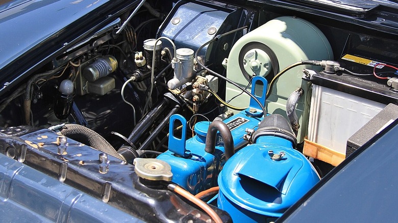 Under-hood shot of a 1.0-liter Datsun 'C' engine