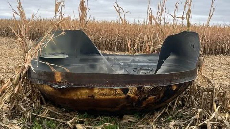 A photo of the Chinese space debris in a Minnesota cornfield