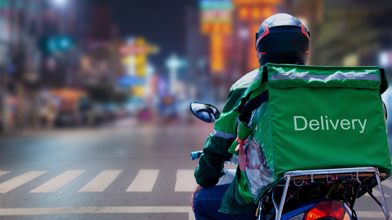 Food delivery driver on a motorcycle
