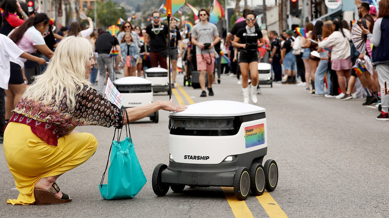 Starship robots roll during the 2023 LA Pride Parade in Hollywood on June 11, 2023 in Los Angeles, California.