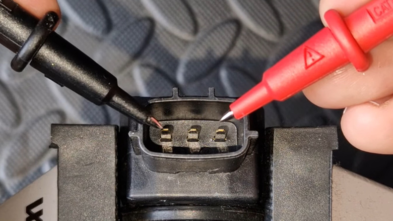 Using a multimeter to test ignition coil