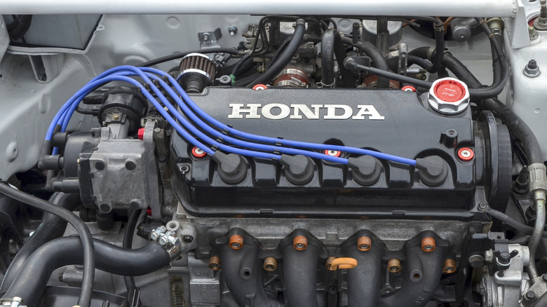 Modified Honda engine with bright blue spark plug wires