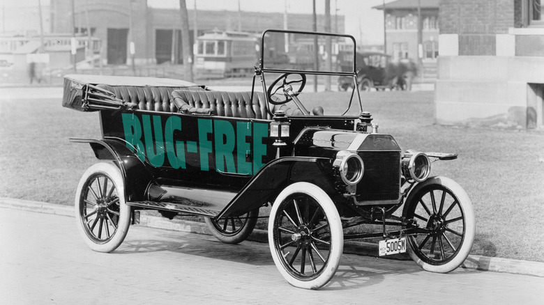 A ford model-t with the words "bug-free" along the side