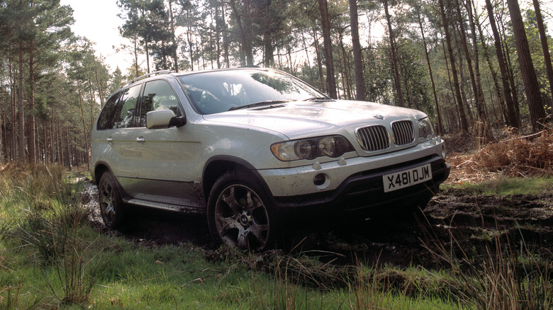 A BMW X5 SUV being driven offroad