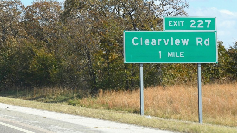 A road sign reads 'Clearview Rd' in Highway Gothic font