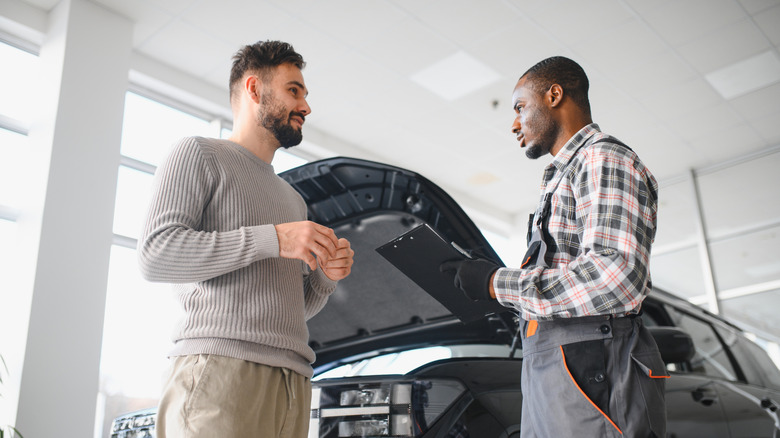 Customer talking to service advisor