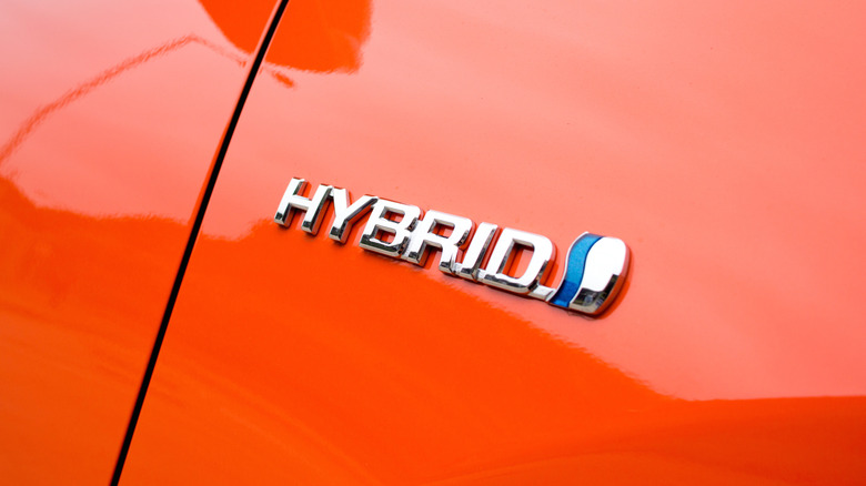 Hybrid badge on the flanks of a Toyota Prius