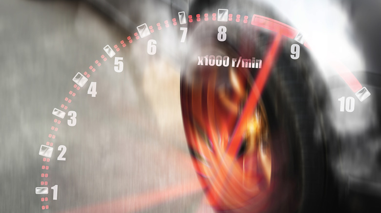 A tachometer hitting the redline, overlaid on a sports car doing a burnout.