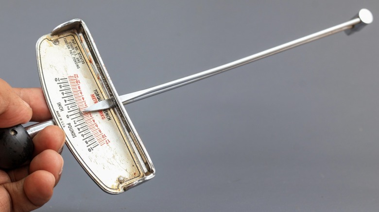 A vintage beam-style torque wrench