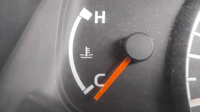 A car's coolant temperature gauge showing cold.