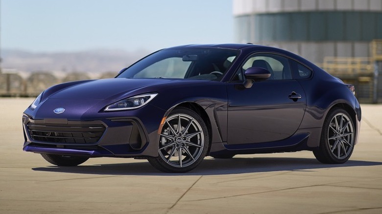 A purple Subaru BRZ sitting in a front three-quarter view.