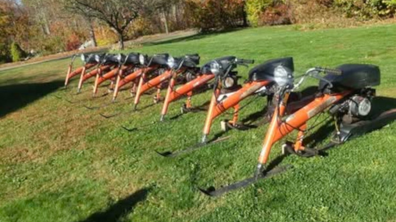 Eight Chrysler Sno-Runners in a line