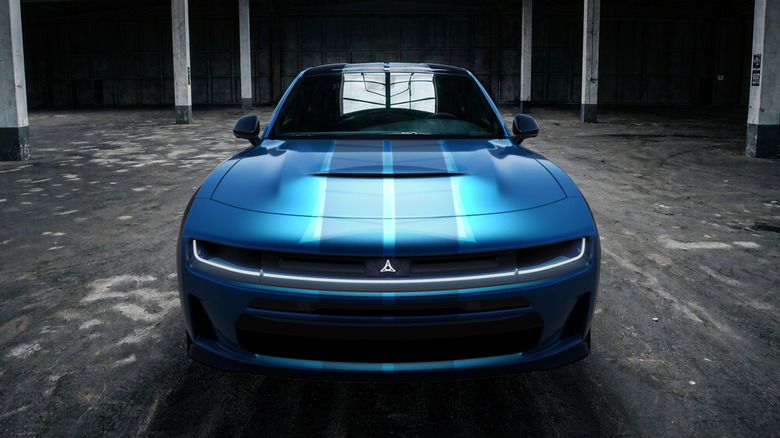 Front end of a blue Dodge Charger with racing stripes