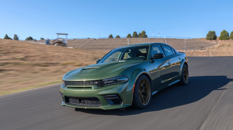 A 2023 Dodge Charger Scat Pack Swinger on a track