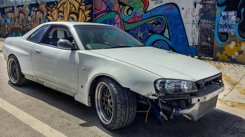 A damaged Nissan Skyline R32