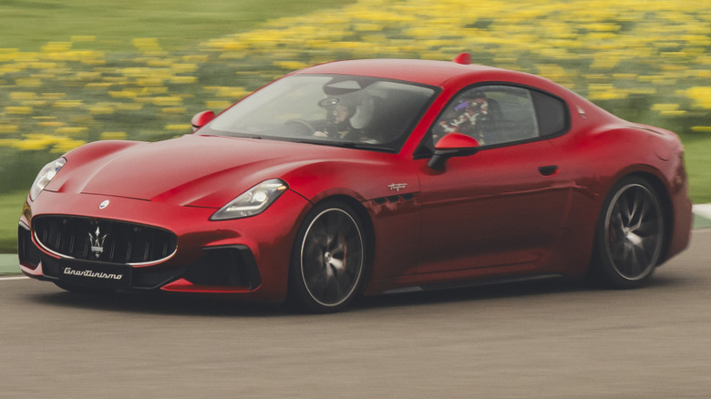 Maserati GranTurismo Trofeo driving on a paved road