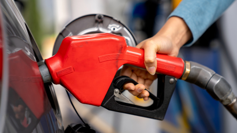 A female utilizing a substance pump to capable her conveyance pinch gas