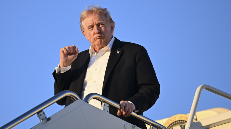 U.S. President Donald Trump disembarks from Air Force One upon arrival from Miami on May 3, 2026 at Joint Base Andrews, Florida.