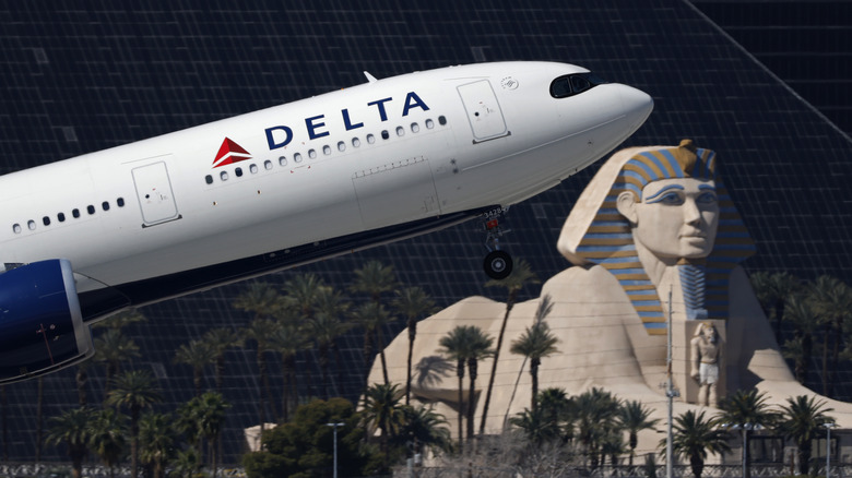An Airbus A330 for Delta Air Lines takes off from Harry Reid International Airport in Las Vegas near the Sphinx