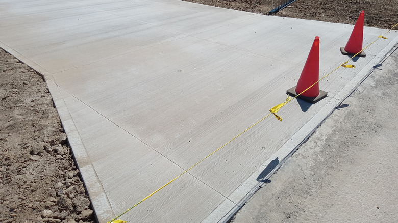 A new concrete driveway being left to cure