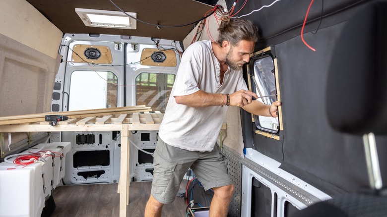 a person working on their van conversion