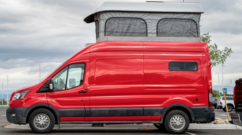 Ford Transit camper conversion with pop-up tent roof