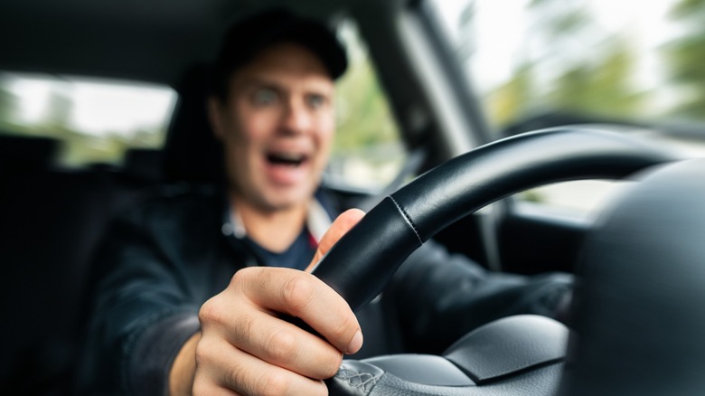 Panicked driver behind the wheel