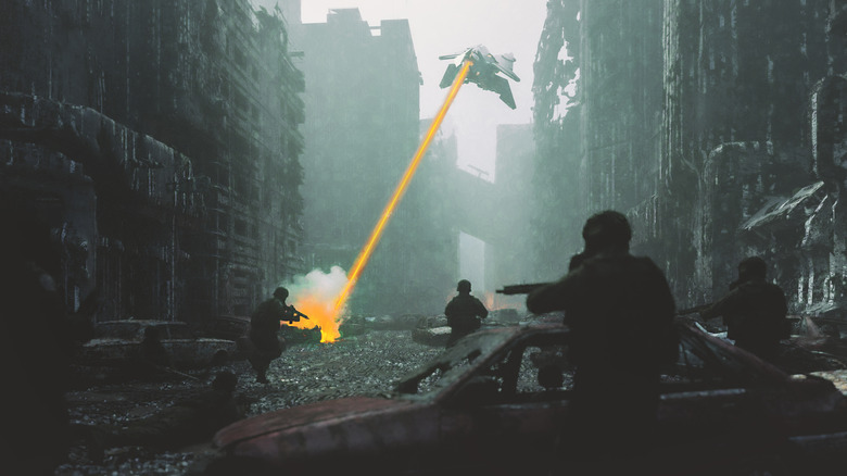 Artist's rendering of a future war, with drones firing lasers at soldiers