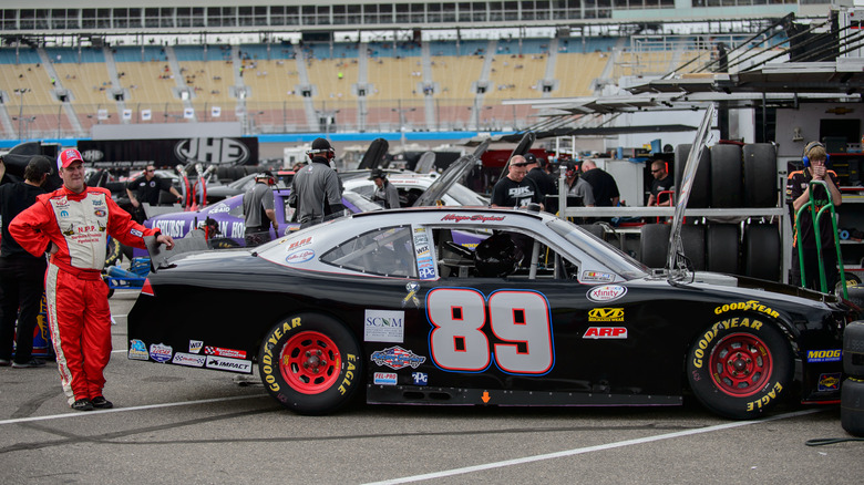 Morgan Shepherd with his car at a 2016 Xfinity race