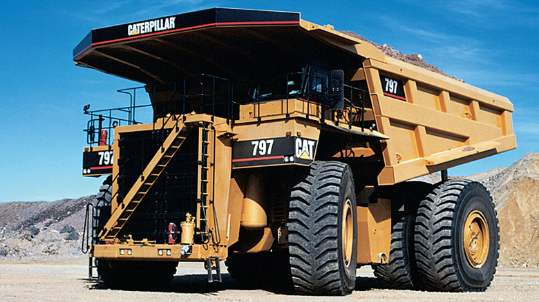 Caterpillar 797 Mining Truck parked on gravel