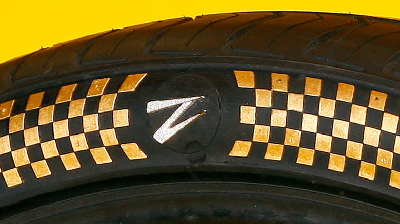 Special Z1 tires adorned with diamonds set in 3D-printed white gold and 24-karat gold leaf,