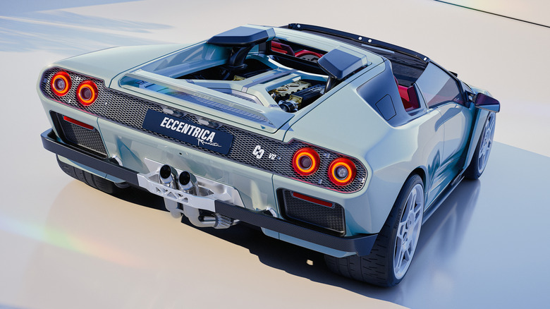 Rear 3/4 view of a blue Eccentrica V12 Roadster