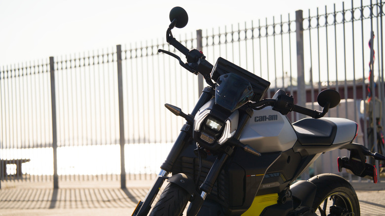 The Can-Am Pulse motorcycle parked connected a cobblestone street