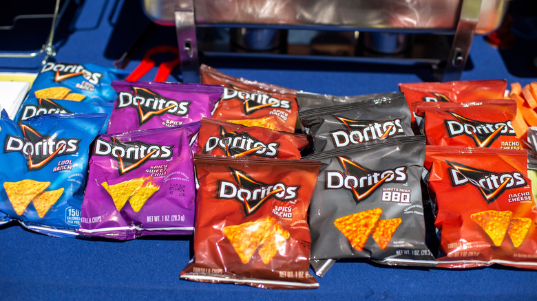 Stock image of bags of Doritos. Five flavors.