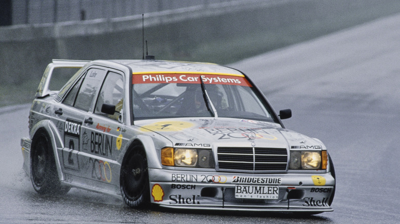 Ellen Lohr racing in the rain in her factory Berlin 2000 W201 Mercedes-Benz 190E 2.5-16 Evolution II.