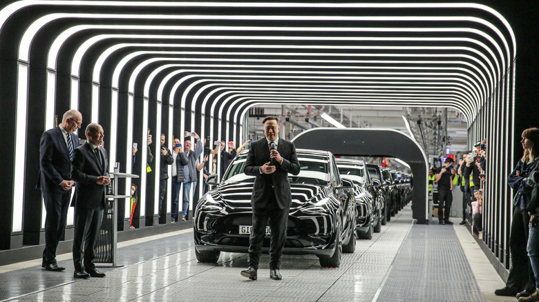 Tesla CEO Elon Musk speaks during the official opening of the new Tesla electric car manufacturing plant on March 22, 2022 near Gruenheide, Germany.