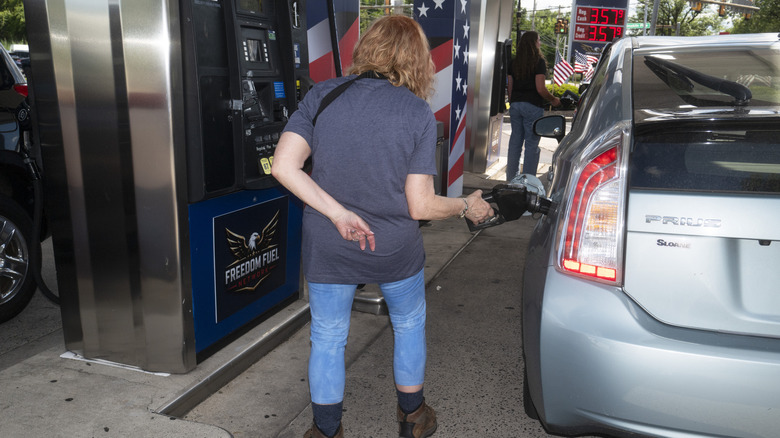 : A customer pumps gas into their Toyota Prius at a Freedom Fuel Network gas station on July 8, 2026 in Dresher, Pennsylvania.