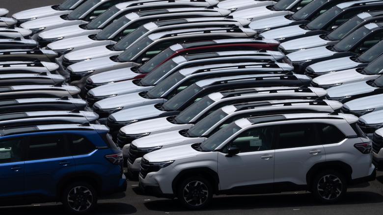 Subaru sport utility vehicles awaiting shipment are parked at a port on July 07, 2025 in Yokohama, Japan.