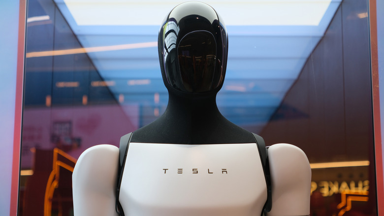Shanghai,China-Feb.15th 2025: Tesla robot (Tesla bot) Optimus with brand logo