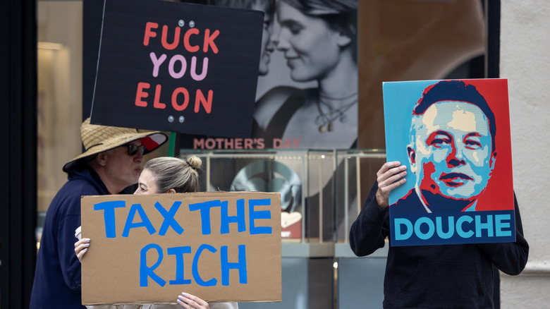 Demonstrators proceed play protestation rallies extracurricular of a Tesla dealership to telephone to boycotting Tesla cars and opposing galore actions taken by President Trump and Tesla proprietor Elon Musk connected May 3, 2025 successful Pasadena, California. Tesla protests person continued to turn crossed nan federation arsenic citizens respond to nan accelerated gait of arguable and unprecedented U.S. argumentation changes by nan Donald Trump management successful its first 100 days.