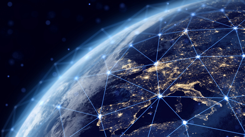 A conceptual image of networked satellites over Europe