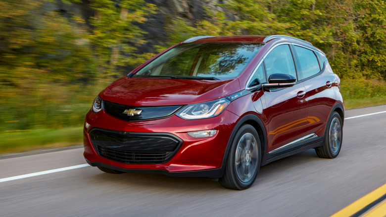 Front 3/4 view of a red Chevrolet Bolt EV