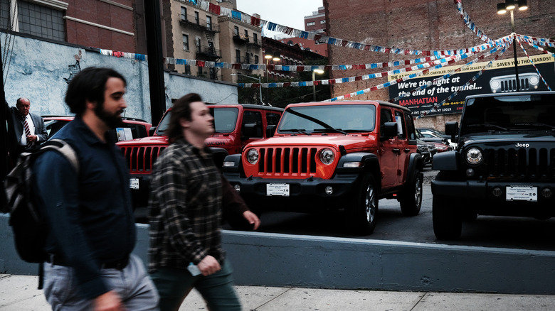 New Jeeps are displayed at a car dealership on October 05, 2021 in New York City. As chip shortages and other parts-supply disruptions upend the auto industry, new vehicle sales fell nearly 26 percent in September in the U.S. A limited selection of new vehicles on dealer's lots is leading to a surge in the price of used vehicles. For the third quarter, auto sales were 3.4 million, down 13 percent from the same period a year ago.