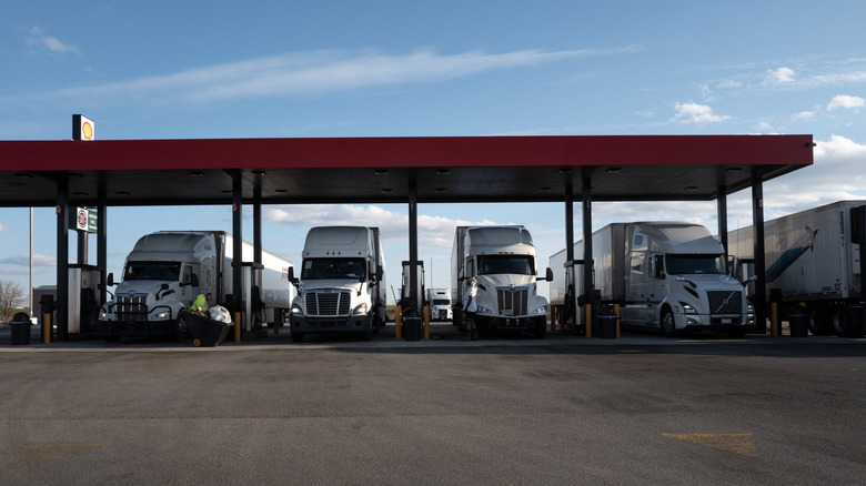 BELVIDERE, ILLINOIS - APRIL 06: Trucks are filled up with diesel fuel at a truck stop on April 06, 2026 in Belvidere, Illinois. The war with Iran has increased the cost of bringing goods to consumers with the national average for diesel climbing to about $5.60 per gallon. (Photo by Scott Olson/Getty Images)